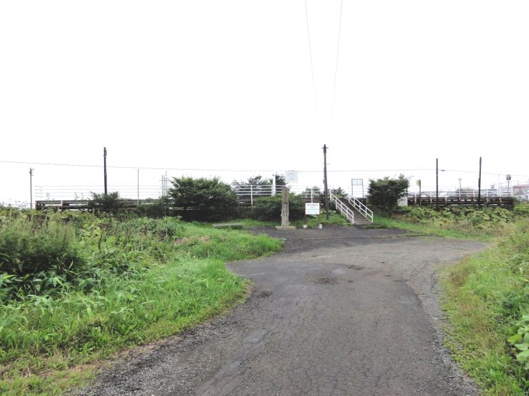 Remote Higashi-Nemuro Station in Hokkaido with snow-dusted abandoned platform and silent ghost-train atmosphere.